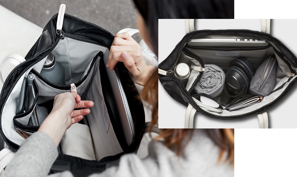 Bellroy Tokyo Tote Premium Black Sandの内部ポップポケットを開く女性と、バッグの中にMacbookやヘッドフォン、水稲などを収納した画像